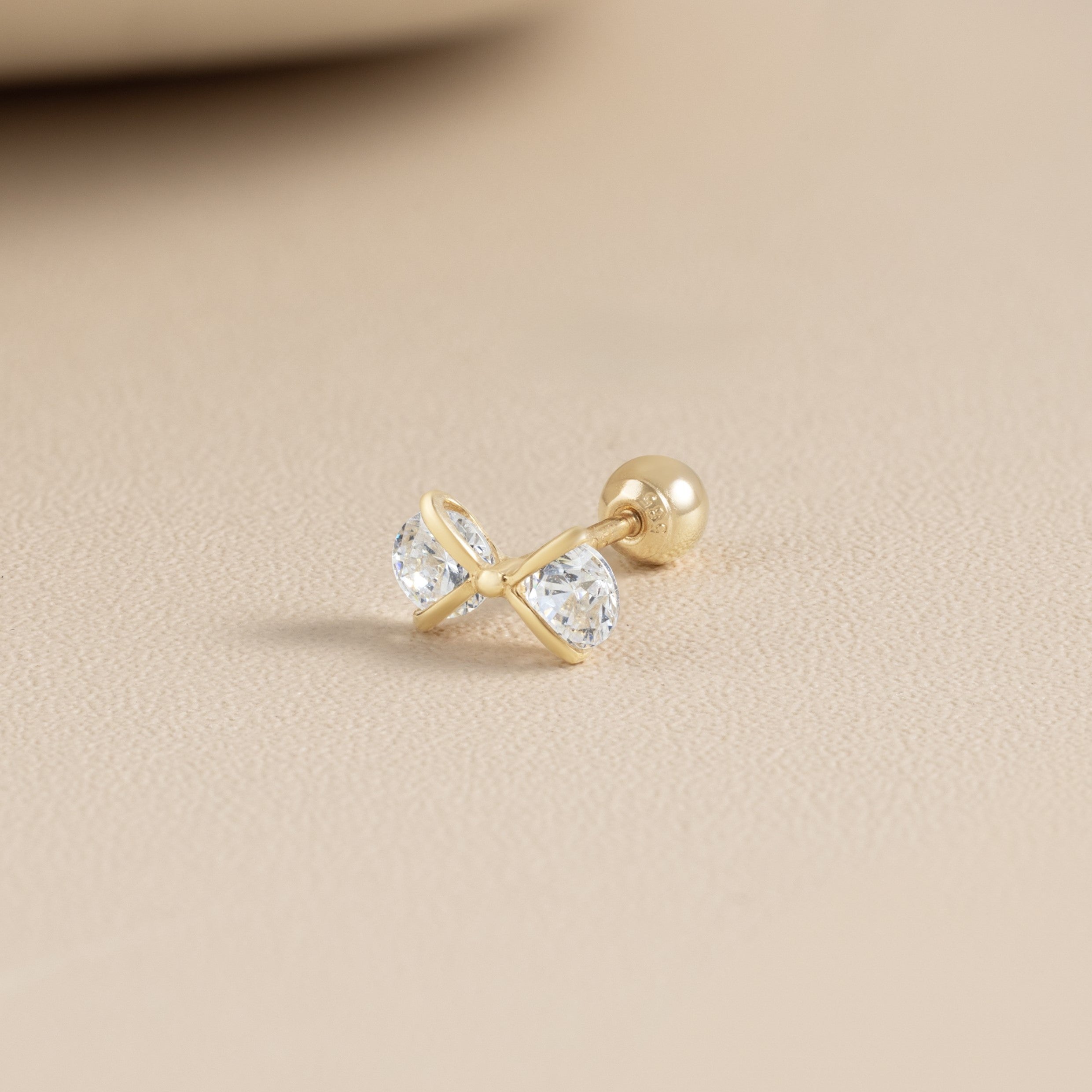 14K (58.5%) SOLID GOLD CUBIC BOW TIE PIERCING